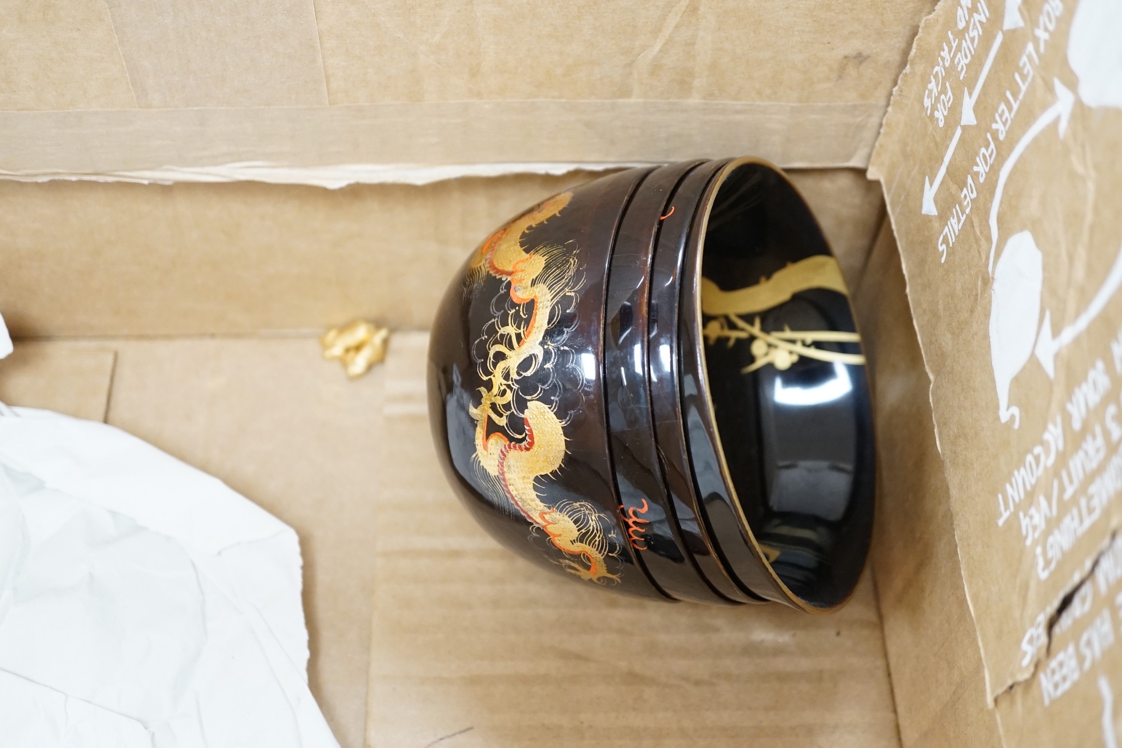 A Japanese red lacquer natsume, 7cm high, and matching tea cup Together with Mixed decorative Oriental and Indian lacquer wares and, a Chinese carved hardwood figure of a sage 39.5cm